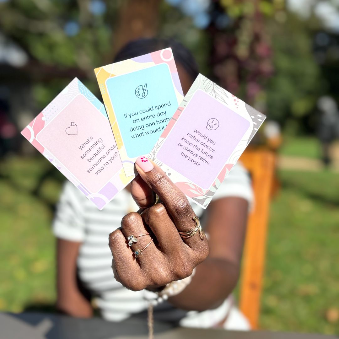 Friends using Life Aligned Conversation Cards at brunch