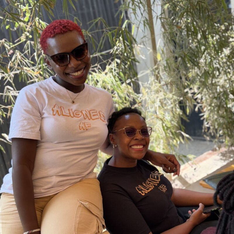 Team photo featuring merchandise